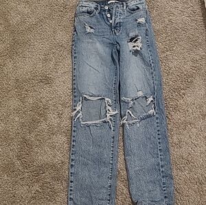 Distressed Blue Denim Jeans